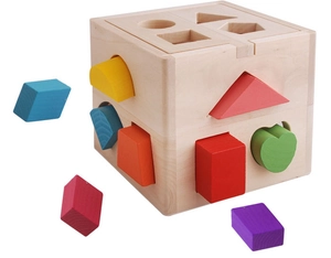 Macro shot of 13-hole wooden puzzle box with colorful geometric blocks for toddlers