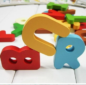Detailed view of colorful wooden alphabet letters for preschool early learning and cognition