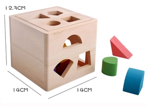 Macro view showing product dimensions 14x14x12.3cm for the wooden shape sorter toy