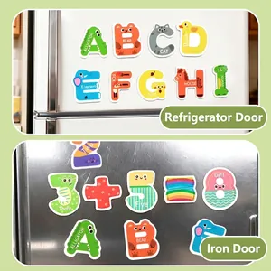 Magnetic alphabet and number set with animal designs on fridge and metal door
