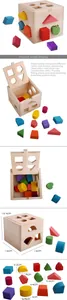 Detail view of 13-hole wooden shape sorter box with colorful geometric blocks for toddlers