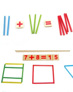 Macro view of colorful wooden counting sticks and math number tiles for educational play