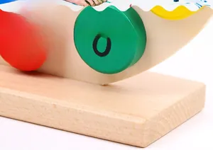 Macro detail of high-quality wooden educational clock toy with natural wood texture