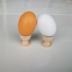 Realistic wooden egg tray with white and brown eggs for kids' pretend play kitchen toy