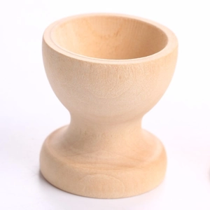 Minimalist wooden egg holder tray with natural wood grain for kitchen play toys