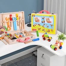 Macro shot of portable wooden toolbox with colorful toy bolts and construction components