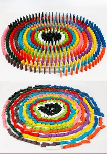 Detailed view of rainbow wooden dominoes showing colorful concentric circle arrangement