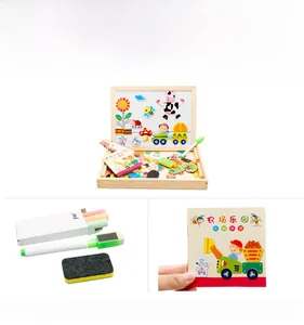 Detail view of magnetic farm puzzle set with wooden box, whiteboard and drawing tools