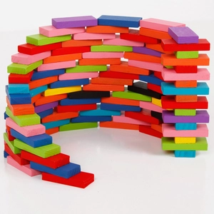 120-piece rainbow wooden domino blocks set arranged in a creative multi-layer arch design