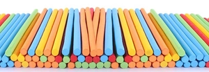 Close-up of five-color wooden counting sticks for children arithmetic and DIY crafts