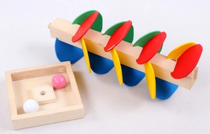 Detailed macro view of colorful wooden leaf petals and ball assembly on toy stand