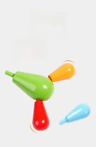 Macro detail of smooth polished wooden cactus parts with colorful interlocking pieces