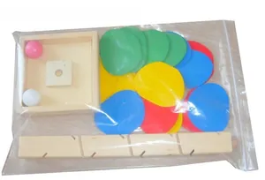 Detail of DIY wooden ball run tower kit showing colorful rubber pads and assembly frame