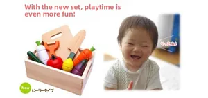 Detailed view of magnetic wooden play food set with vegetable models and storage box