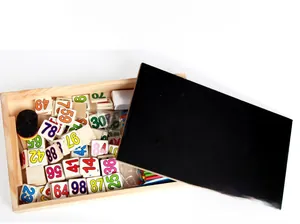 Detailed view of colorful counting sticks and wooden number blocks in learning box