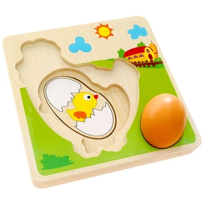 Educational wooden puzzle showing life cycle of a chicken with colorful farm illustration