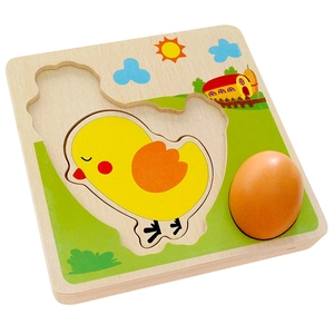Educational wooden chicken life cycle puzzle with chick and egg pieces on farm board