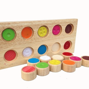 Montessori wooden sensory matching toy with colorful textured cylinders for early learning
