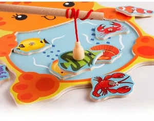 Detail of wooden magnetic fishing toy with colorful ocean animal pieces and a fishing rod