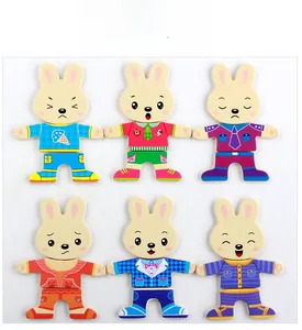 Wooden rabbit dress-up puzzle set with various expressions and outfits for kids