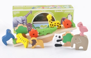 Macro shot of forest animal wooden blocks balanced on a seesaw with original packaging