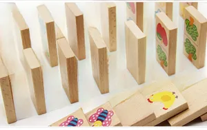 Detail of wooden dominoes with colorful animal prints for children's educational play