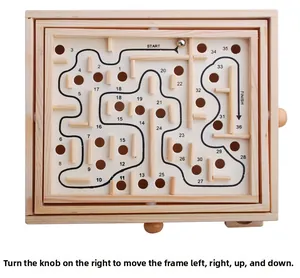 Detail of wooden labyrinth puzzle with 36 levels and metal ball for coordination