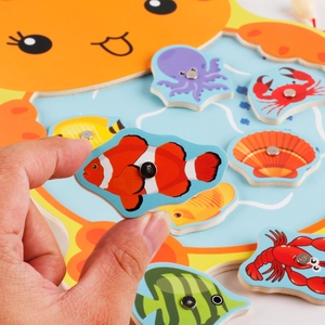 Kids wooden magnetic fishing toy set featuring colorful marine animals and rods