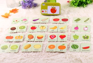 Bilingual fruit and vegetable educational matching cards in a green tin storage box