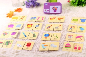 Macro view of bilingual educational matching cards with colorful hand-drawn illustrations