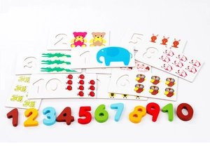Detail of wooden number blocks and animal cards for kids math and counting enlightenment