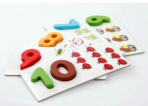 Macro view of wooden numerical puzzle boards with colorful numbers and animal graphics
