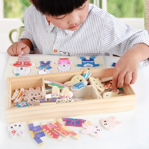 Children's wooden rabbit dress-up puzzle set with storage box and colorful outfit pieces