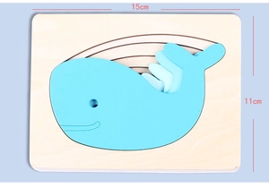 Size specifications of a multilayer wooden whale puzzle measuring 15cm by 11cm for kids