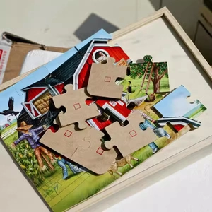 Educational farm scene wooden puzzle for toddlers with barns and animals on board