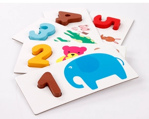 Close-up of thick wooden number blocks with colorful animal matching cards for kids