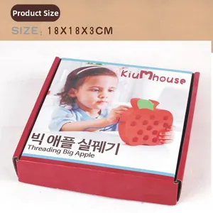 Detail of wooden threading apple toy in red packaging box with size specifications