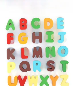 Detailed top view of 26 colorful wooden uppercase letters for alphabet recognition