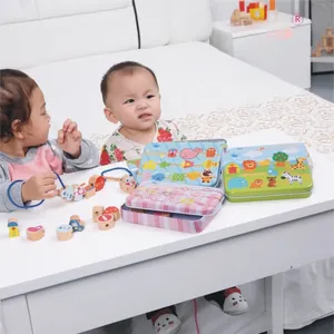 Children playing with wooden animal beads and colorful metal storage boxes for learning