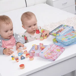 Educational beech wood bead set with vehicles and numbers in colorful tin storage boxes