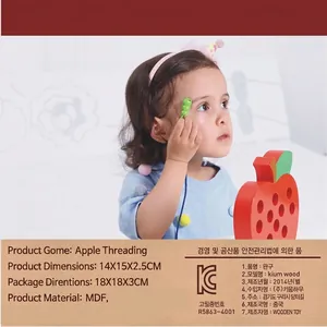 Educational red wooden apple lacing toy with caterpillar needle for toddler motor skills