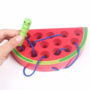 Wooden watermelon lacing toy with caterpillar needle for toddler coordination