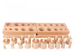 Set of four wooden Montessori cylinder blocks for early educational sensory learning