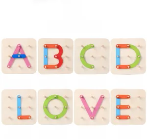 Detail showing 9-hole wooden base with colorful blocks forming letters A to E and LOVE