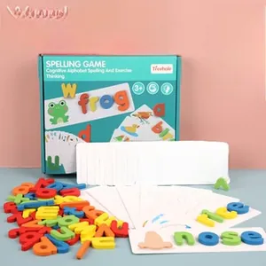 Close-up of wooden alphabet blocks and word learning cards for educational spelling games
