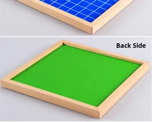 Detailed view of the double-sided wooden frame board showing grid and solid green surface