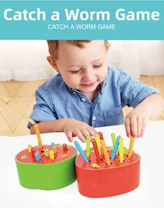 Detailed view of child using a wooden magnetic rod to catch colorful worms for motor skills