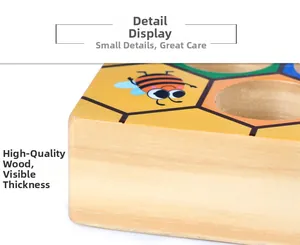 Close-up of thick wooden Montessori bee game board with smooth rounded corners