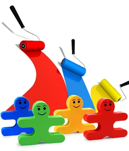 Close-up of colorful wooden balance figures and paint rollers for educational play