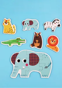 Flat lay detail of colorful wooden animal puzzles featuring elephant and lion for kids